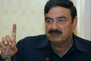 FILE - Pakistan's Muslim League-Q party leader Sheikh Rashid Ahmed gestures during a press conference in Islamabad, Pakistan, on Feb. 20, 2008. Pakistani police arrested the prominent political figure in an overnight raid on his home near Islamabad days after he accused the former president of the country of plotting to kill ex-prime minister Imran Khan, officials said Thursday, Feb. 2, 2023. (AP Photo/Anjum Naveed, File)