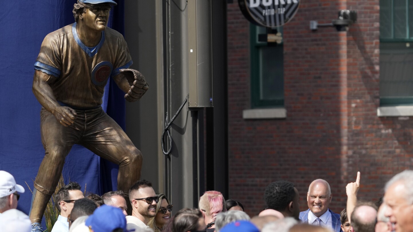 Cubs unveil statue depicting Hall of Famer Ryne Sandberg in a familiar defensive crouch - The Associated Press