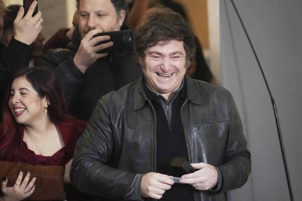 Argentina's President Javier Milei arrives to vote in city legislatures elections in Buenos Aires, Argentina Sunday, May 18, 2025. (AP Photo/Rodrigo Abd)