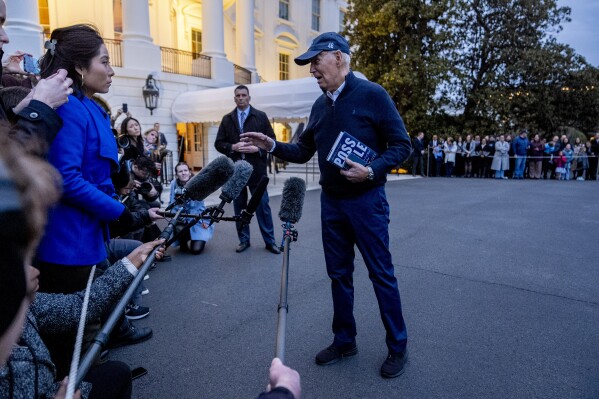 President Joe Biden speaks to members of the media before boarding Marine One on the South Lawn of the White House in Washington, Friday, March 1, 2024, to travel to Camp David, Md., for the weekend. (AP Photo/Andrew Harnik)