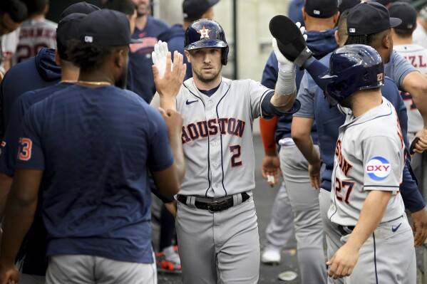 Houston, United States. 30th June, 2022. Houston Astros third baseman Alex  Bregman (2) hits a 2 RBI double to deep let field during the third inning  of the MLB game between the