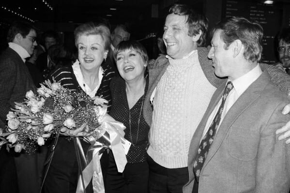 FILE - Actors Angela Lansbury, left, and Len Cariou, right, who starred in the musical "Sweeney Todd" appear with their replacements Dorothy Loudon, second left, and George Hearn at a New York restaurant, prior to their final performance on March 3, 1980. Lansbury died peacefully at her home in Los Angeles on Tuesday, Oct. 11. She was 96. (AP Photo/Ray Stubblebine, File)