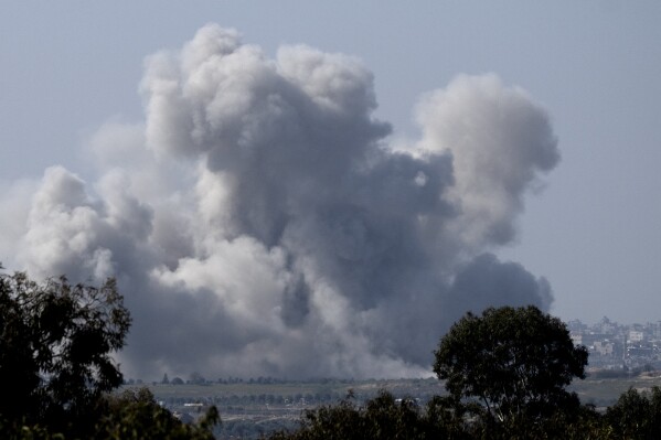 Smoke rises following an Israeli bombardment in the Gaza Strip, as seen from southern Israel, Friday, Jan. 19, 2024. (AP Photo/Maya Alleruzzo)