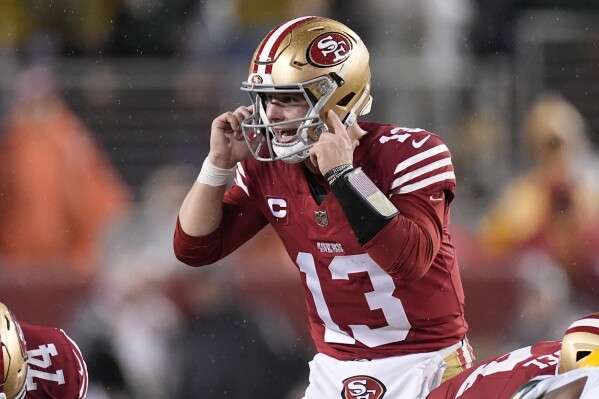 San Francisco 49ers quarterback Brock Purdy (13) calls a play during the first half of an NFL football NFC divisional playoff game against the Green Bay Packers, Saturday, Jan. 20, 2024, in Santa Clara, Calif. (AP Photo/Godofredo A. Vásquez)