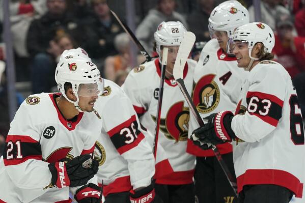Ottawa Senators right wing Mathieu Joseph (21) celebrates his goal against the Detroit Red Wings in the third period of an NHL hockey game Friday, April 1, 2022, in Detroit. (AP Photo/Paul Sancya)