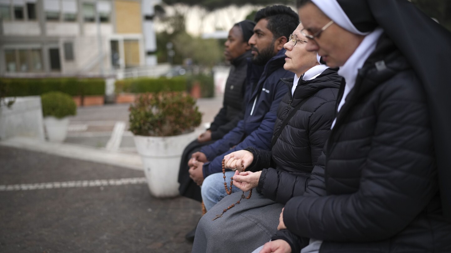 Pope marks 1 week in hospital with pneumonia as the obvious question gets asked: Might he resign?