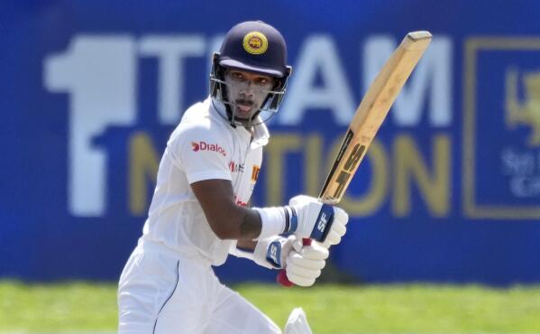 Sri Lanka's Pathum Nissanka plays a shot during the day one of the first test cricket match between Sri Lanka and West Indies' in Galle, Sri Lanka, Sunday, Nov. 21, 2021. (AP Photo/Eranga Jayawardena)