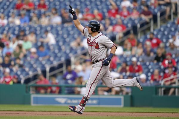 Atlanta Braves' Austin Riley gestures as he rounds the bases after hitting a two-run home run in the first inning of a baseball game against the Washington Nationals, Friday, July 15, 2022, in Washington. (AP Photo/Patrick Semansky)