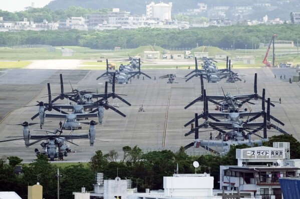 FILE - U.S. MV-22B Osprey transport aircraft are parked at the U.S. Marine Corps Air Station Futenma in Ginowan, south of Okinawa, southern Japan, Wednesday, Sept. 6, 2023. Air Force Special Operations Command said Tuesday it knows what failed on its CV-22B Osprey leading to a November crash in Japan that killed eight service members. But it still does not know why the failure happened. Because of the crash almost the entire Osprey fleet, hundreds of aircraft across the Air Force, Marine Corps and Navy, has been grounded since Dec. 6. (AP Photo/Hiro Komae, File)