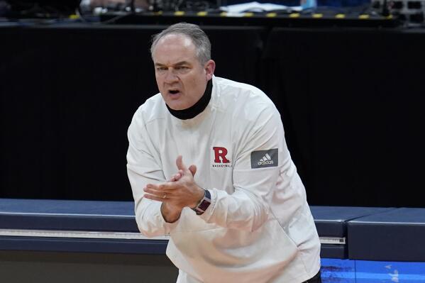 FILE - In this March 19, 2021, file photo, Rutgers head coach Steve Pikiell claps during the first half of a men's college basketball game against Clemson in the first round of the NCAA tournament  in Indianapolis. Rutgers of the Big Ten Conference made the NCAA Tournament last season for the first time since 1991. The Scarlet Knights defeated Clemson in the opening round of the tournament and lost to Houston in the second round. (AP Photo/Paul Sancya, File)