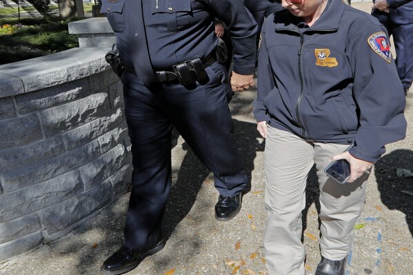 
              Louisiana State Fire Marshal Butch Browning leaves the St. Landry Parish courthouse after a bond hearing for Holden Matthews in Opelousas, La., Monday, April 15, 2019. Matthews, who is white, and is the son of a St. Landry Parish sheriff's deputy, was arrested Wednesday on three charges of arson of a religious building, and is the suspect in three recent arson fires that destroyed African American churches in Louisiana. (AP Photo/Gerald Herbert)
            