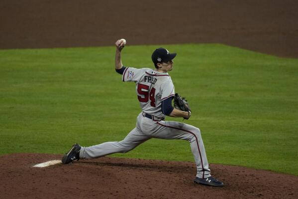 Atlanta Braves starting pitcher Steve Avery walks off the field