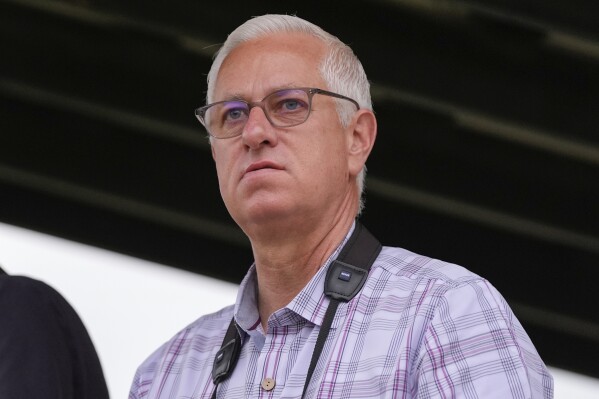 Trainer Todd Pletcher watches Belmont Stakes entrant Mindframe work out ahead of the 156th running of the Belmont Stakes horse race at Saratoga Race Course, Thursday, June 6, 2024, in Saratoga Springs, N.Y. (AP Photo/Julia Nikhinson)