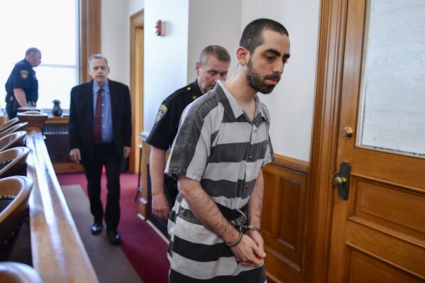 Hadi Matar walks in to the Chautauqua County court in Mayville, N.Y., Friday, May. 16, 2025. (AP Photo/Adrian Kraus)