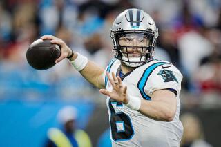 Mayfield unsure how Panthers handle 'looming question' at QB