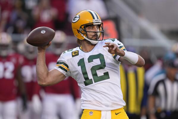 Green Bay Packers quarterback Aaron Rodgers (12) passes against the San Francisco 49ers during the first half of an NFL football game in Santa Clara, Calif., Sunday, Sept. 26, 2021. (AP Photo/Tony Avelar)