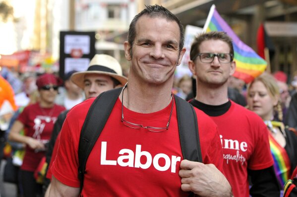 Labor Party candidate for Sydney City Council and former National Rugby League football player Ian Roberts marches in a marriage equality rally in Sydney, Aug. 13, 2016. In 1995 Roberts became the first high-profile Australian sportsperson to come out as gay. (Joel Carrett/AAP Image via AP)