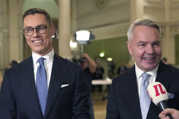 National Coalition Party candidate Alexander Stubb, left, and Social Movement candidate Pekka Haavisto attend a Presidential election event, at the Helsinki City Hall, in Helsinki, Finland, Sunday, Feb. 11, 2024. Alexander Stubb is projected to win Finland’s presidential election runoff on Sunday against the former Foreign Minister Pekka Haavisto. (AP Photo/Sergei Grits)