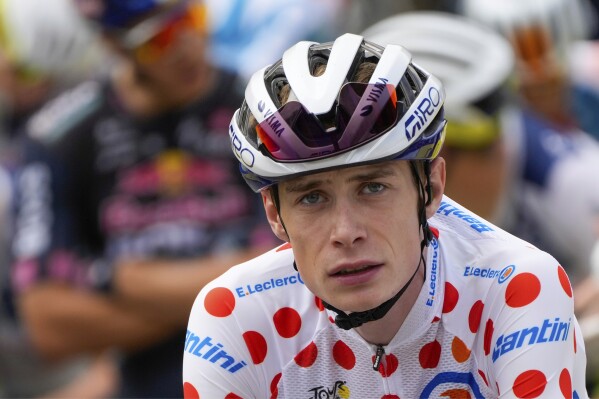 Denmark's Jonas Vingegaard waits for the start of the nineteenth stage of the Tour de France cycling race over 144.6 kilometers (89.9 miles) with start in Embrun and finish in Isola 2000, France, July 19, 2024. (AP Photo/Jerome Delay, File)