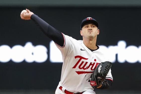 Minnesota Twins starting pitcher Tyler Mahle throws to a Kansas City Royals batter during the first inning of a baseball game Thursday, April 27, 2023, in Minneapolis. (AP Photo/Bruce Kluckhohn)
