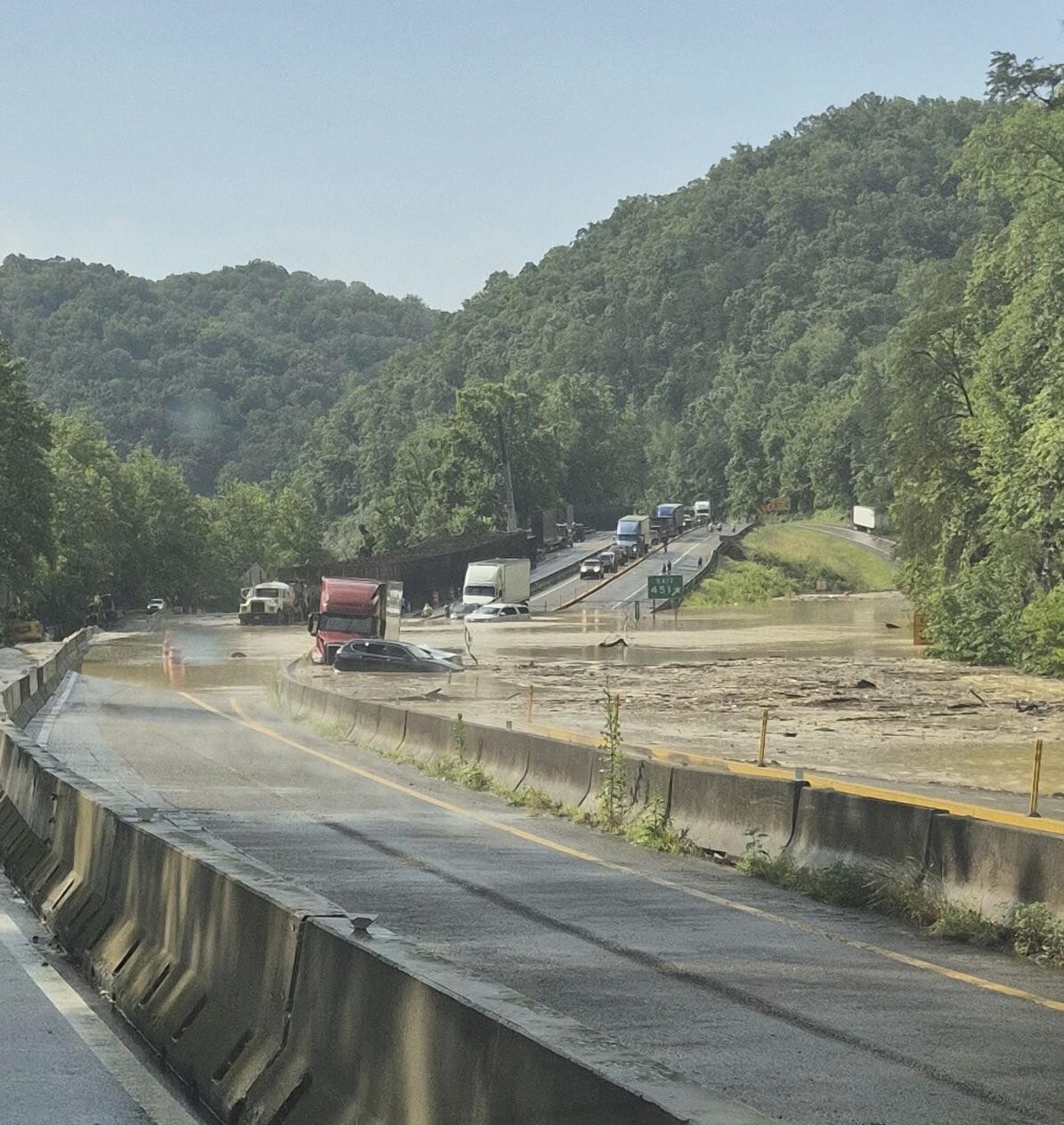 Rock slides and flooding close damaged section of I-40 in Smoky Mountains