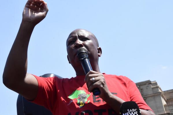 Leader of the Economic Freedom Fighters (EFF) Julius Malema, addresses supporters in Pretoria, South Africa, Monday March 20, 2023. The party has called for a nation-wide shutdown and mass demonstrations to press President Cyril Ramaphosa to resign. (AP Photo/Frans Sello waga Machate)