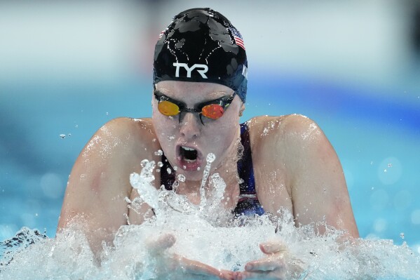 Lilly King, of the United States, competes in the women's 100-meter breaststroke semifinal at the 2024 Summer Olympics, July 28, 2024, in Nanterre, France. (AP Photo/Matthias Schrader, File)