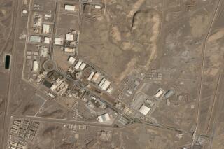 In this satellite photo from Planet Labs PBC, Iran's Natanz nuclear site is seen March 14, 2022. The United Nations atomic watchdog said Thursday, April 14, 2022, it installed surveillance cameras to monitor a new centrifuge workshop at Iran's underground Natanz site after a request from Tehran, even as diplomatic efforts to restore its tattered nuclear deal appear stalled. (Planet Labs PBC via AP)