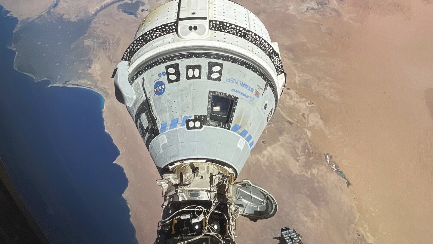 FILE - This photo provided by NASA shows the Starliner spacecraft docked to the Harmony module of the International Space Station, orbiting 262 miles above Egypt's Mediterranean coast, on June 13, 2024. (NASA via AP, File)