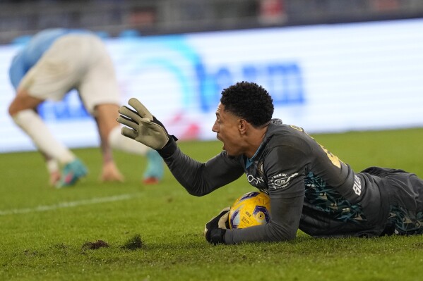 Udinese's goalkeeper Maduka Okoye gestures after saving during a Serie A soccer match between Lazio and Udinese, at Rome's Olympic Stadium, Monday, March 11, 2024. (AP Photo/Andrew Medichini)