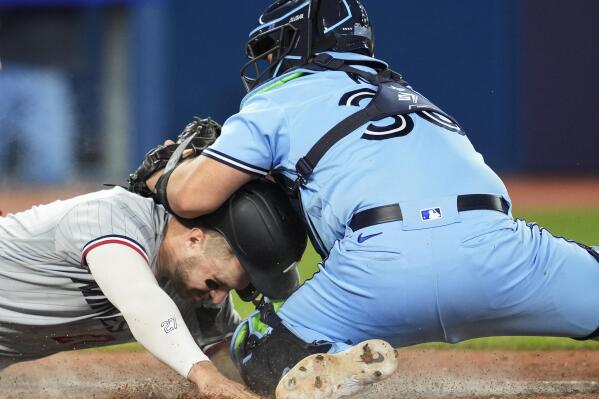 Kirk's pinch-hit double and 3 homers by Toronto power the Blue Jays past  the Rockies 13-9