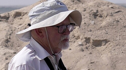 FILE - Peter Hellyer, visits an ancient Christian monastery on Siniyah Island in Umm al-Quwain, United Arab Emirates, Thursday, Nov. 3, 2022. Peter Hellyer, a British born writer with wide-ranging interests who spent nearly five decades chronicling the history, natural beauty and modern transformation of the United Arab Emirates, has died at the age of 75, local media reported Monday, July 3, 2023. (AP Photo/Kamran Jebreili, File)