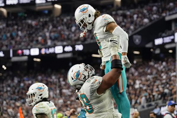 Dolphins rally with Brissett falls short against Raiders