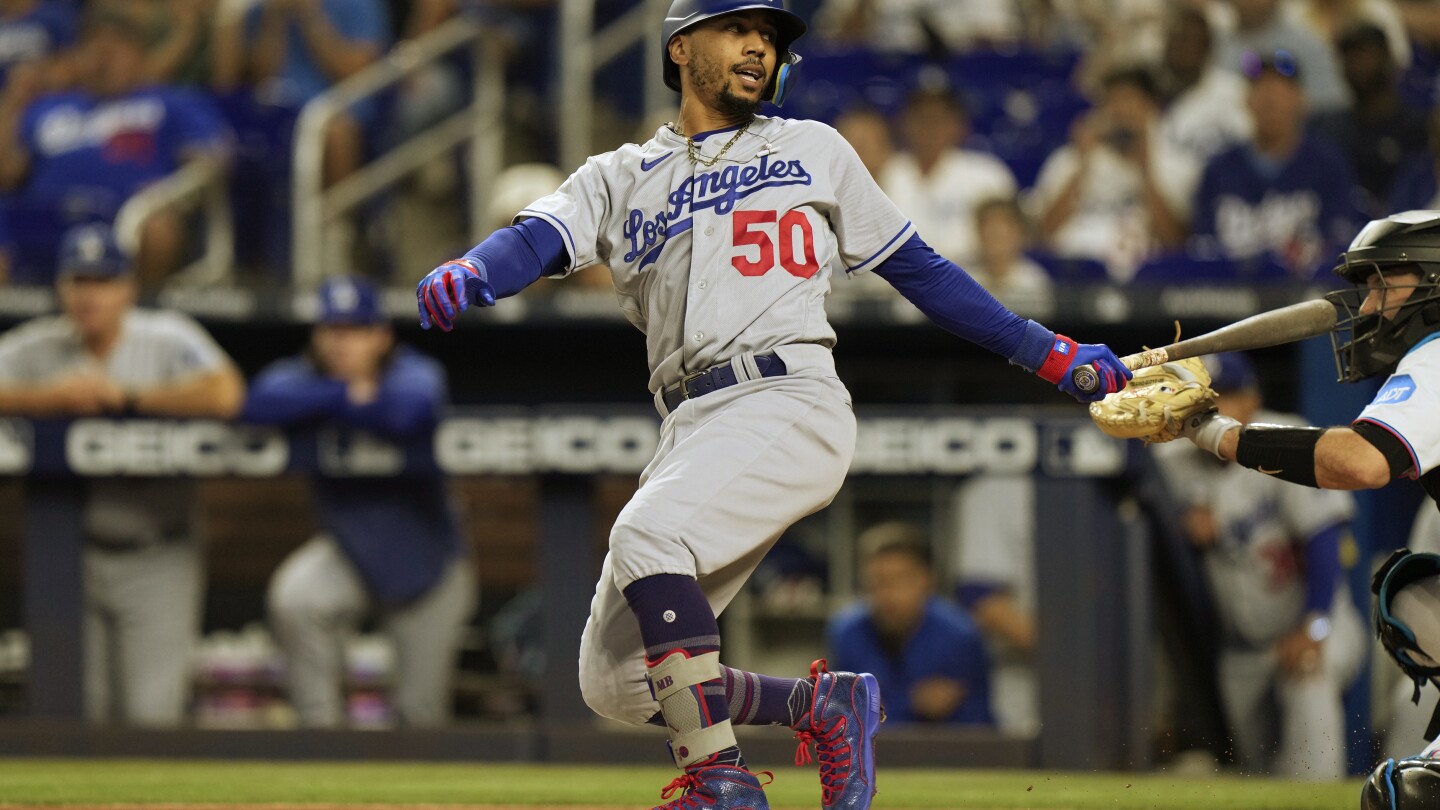 Dodgers' Mookie Betts has bone bruise in left foot, expected to