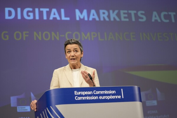 FILE - European Commissioner for Europe fit for the Digital Age Margrethe Vestager speaks during a media conference regarding the Digital Markets Act at EU headquarters in Brussels, Monday, March 25, 2024. The European Commission, the EU's executive branch, said on Monday, May 13, 2024, Booking.com meets the threshold to be classed as a “core platform service” under the 27-nation bloc's Digital Markets Act. The sweeping set of rules is designed to prevent Big Tech platforms from dominating online markets. (AP Photo/Virginia Mayo, File)