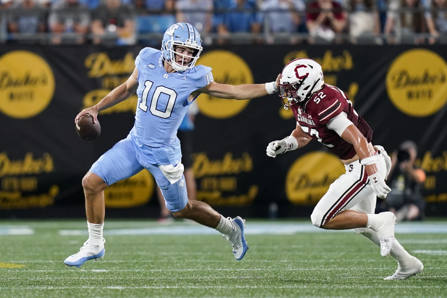 Drake Maye throws 2 TDs, No. 21 North Carolina has 9 sacks in 31-17 win over South Carolina