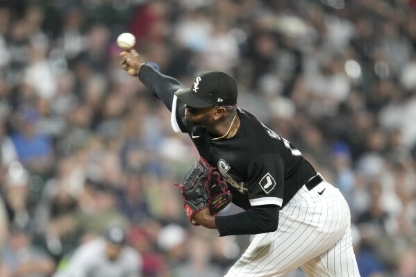 Chicago White Sox relief pitcher Gregory Santos delivers to a New York Yankees batter during the eighth inning of a baseball game Wednesday, Aug. 9, 2023, in Chicago. (AP Photo/Charles Rex Arbogast)