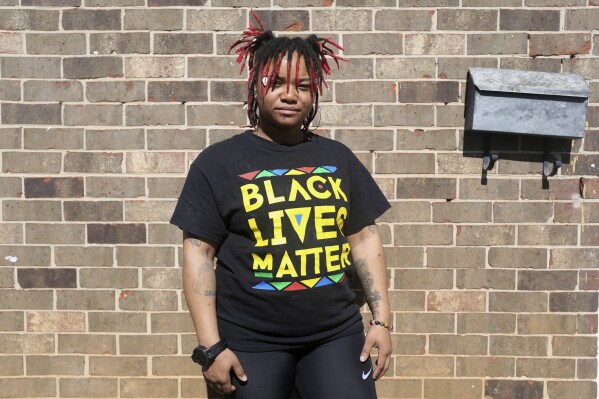 Nia Thomas stands in front of her Atlanta home on Feb. 14, 2024. Thomas was bailed out of jail by the nonprofit Barred Business in May 2022 through the 鈥淢ama鈥檚 Day Bail Out,鈥� initiative, a practice that could be significantly restricted, if not criminalized, under a recently passed Georgia bill. (APPhoto/R.J. Rico)