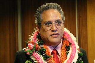 FILE - Former Senate Majority Leader J. Kalani English speaks to reporters on opening day of the state Legislature at the state Capitol in Honolulu, on Jan. 16, 2019. English was sentenced to 40 months in prison Tuesday, July 5, 2022, for taking bribes in exchange for shaping legislation while in office. English pleaded guilty to honest services wire fraud in February, admitting he accepted bribes from a Hawaii business owner in exchange for shaping legislation that would benefit a company involved in publicly financed cesspool conversion projects. (AP Photo/Audrey McAvoy, File)