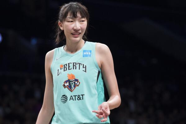 FILE - New York Liberty center Han Xu is shown during the first half of a WNBA exhibition basketball game against China, Thursday, May 9, 2019, in New York. Standing 6-10, Han would like to emulate Yao Ming's impact — including his influence on the sport in China. She wants to be a female beacon of basketball in her native land. (AP Photo/Mary Altaffer, File)