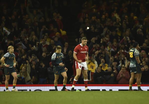 Wales' Rhys Priestland, second from right, reacts after scoring a winning penalty kick during the rugby union international match between Wales and Australia at the Principality Stadium in Cardiff, Wales, Saturday, Nov. 20, 2021. (AP Photo/Rui Vieira)