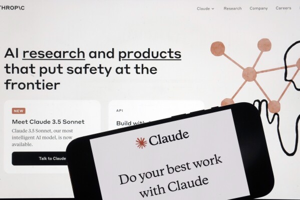 FILE - The Anthropic website and mobile phone app are shown in this photo, in New York, July 5, 2024. (AP Photo/Richard Drew, File)