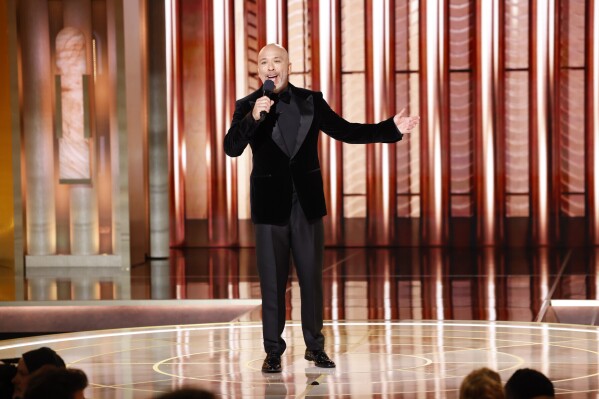 This image released by CBS shows host Jo Koy during the 81st Annual Golden Globe Awards in Beverly Hills, Calif., on Sunday, Jan. 7, 2024. (Sonja Flemming/CBS via AP)
