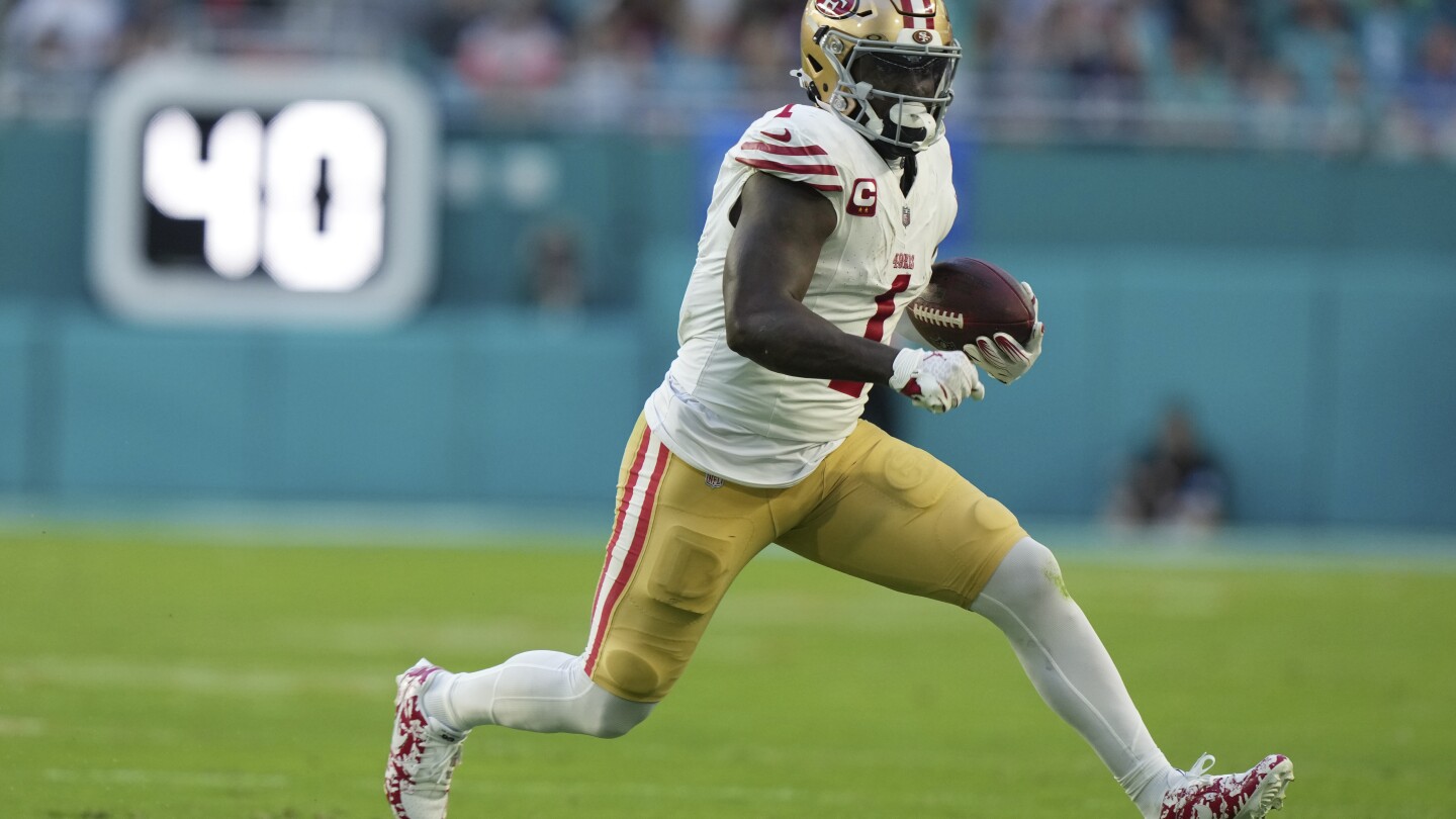 Commanders acquire wide receiver Deebo Samuel in a trade with the 49ers, AP source says