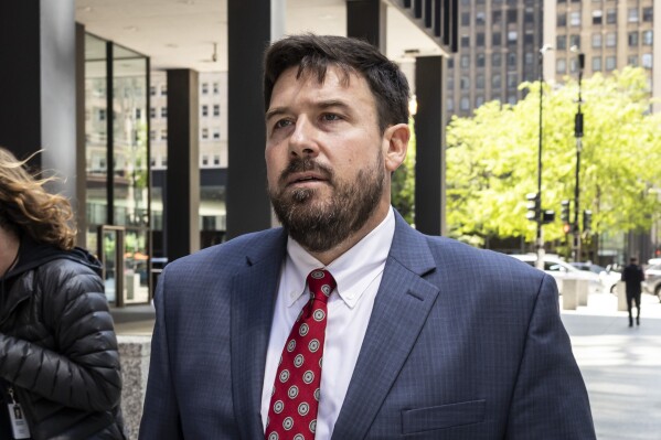 FILE -Richard Globensky, of Georgia, walks out of the Dirksen Federal Courthouse after pleading guilty to transporting stolen golf merchandise and memorabilia from the Augusta National Golf Club, Wednesday, May 15, 2024. (Ashlee Rezin/Chicago Sun-Times via AP, File)