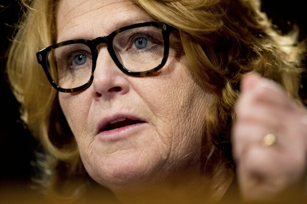 
              FILE - In this Feb. 14, 2017, photo, Sen. Heidi Heitkamp, D-N.D., testifies in front of the Senate Banking Committee in Washington. Heitkamp, one of the few Democratic senators who'd been undecided on the Supreme Court nominee Brett Kavanaugh, tells a television station she will vote against Kavanaugh. (AP Photo/Andrew Harnik, File)
            