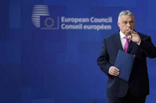 Hungary's Prime Minister Viktor Orban arrives for an EU summit at the European Council building in Brussels, Thursday, Dec. 14, 2023. European Union leaders, in a two-day summit will discuss the latest developments in Russia's war of aggression against Ukraine and continued EU support for Ukraine and its people. (AP Photo/Virginia Mayo)