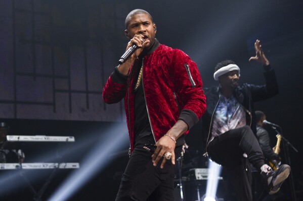 FILE - Usher performs at Power 105.1's Powerhouse 2016 at Barclays Center in New York on Oct. 27, 2016. Usher will perform at the halftime show for the 2024 Super Bowl. (Photo by Scott Roth/Invision/AP, File)