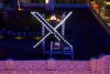 File - Workers install lighting on an "X" sign atop the company headquarters, formerly known as Twitter, in San Francisco, on July 28, 2023. Before it transformed into X, Twitter was the place to turn to for live and reliable information about big news events, from wars to natural disasters. But as the Israel-Hamas war has underscored, that is no longer the case. (AP Photo/Noah Berger, File)