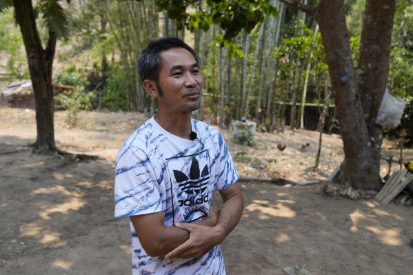 Village chief Nanthawat Tiengtrongsakun talks to The Associated Press about the Pakanyo's tribes controlled burns during interview at Chiang Mai province, Thailand, Monday, April 22, 2024. (AP Photo/Sakchai Lalit)